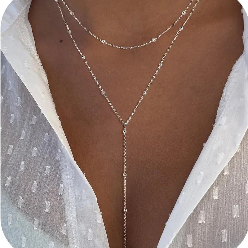 Collier ras-du-cou avec pendentif en Y en acier inoxydable